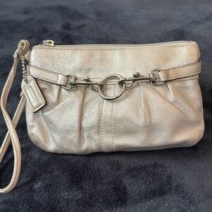 Coach | Silver Metallic Stud Buckle Wristlet